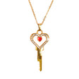 Gold key-shaped pendant with a heart design and red stone Chastity Key Necklace