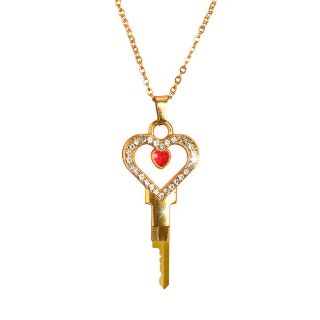 Gold key-shaped pendant with a heart design and red stone Chastity Key Necklace