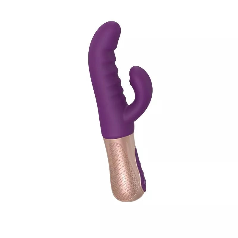 A purple and beige rabbit vibrator with dual stimulation design, displayed alongside its box and a black storage pouch. The product has a curved silicone shaft and a smaller attachment for clitoral stimulation.