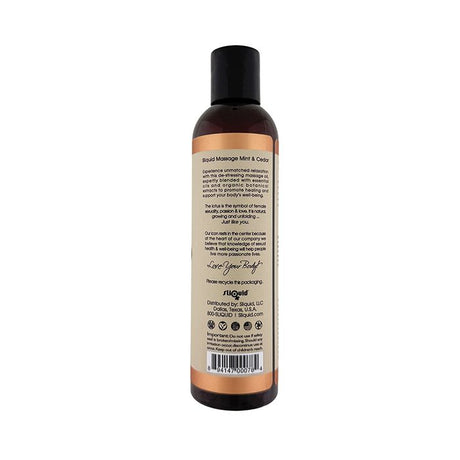 an 8.5 ounce bottom of sliquid cedar mint massage oil for couples