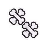 Two black and white bone-shaped nipple pasties 