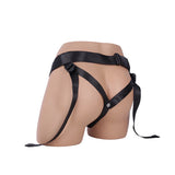 strap on harness on a mannequin against a white background