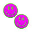 a pair of smiley face breast pasties that are neon green and pink and glow in the darks