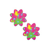 a pair of neon pink paint splatter flower petal nipple pasties with neon yellow and neon green paint splatter