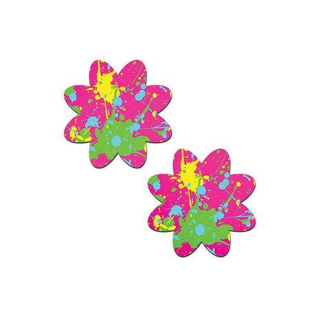 a pair of neon pink paint splatter flower petal nipple pasties with neon yellow and neon green paint splatter
