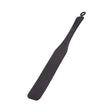 black paddle for impact play that has a smooth side