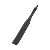 black paddle for impact play that has a smooth side