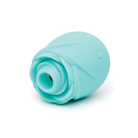 Turquoise clitoral rose toy stimulator that glows in the dark
