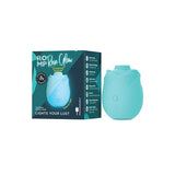 Turquoise clitoral rose toy stimulator that glows in the dark