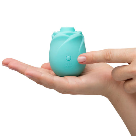 Turquoise clitoral rose toy stimulator that glows in the dark