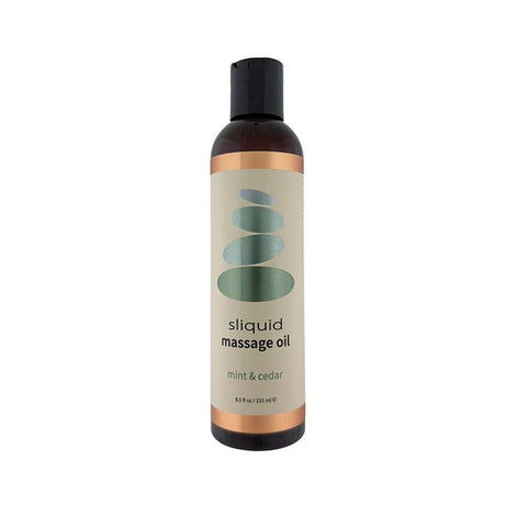 an 8.5 ounce bottom of sliquid cedar mint massage oil