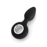 Black silicone butt plug with silver ring 